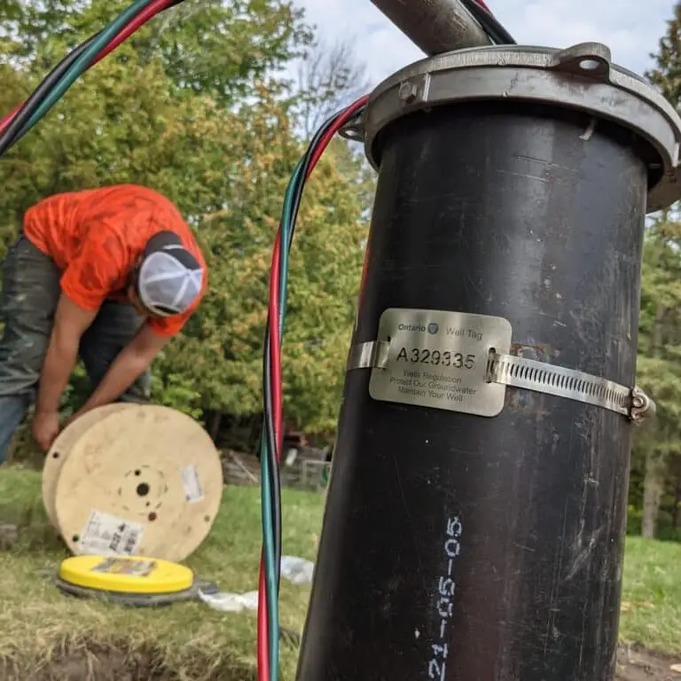 Well Technician Installs a Submersible Well Pump in Rural Ottawa